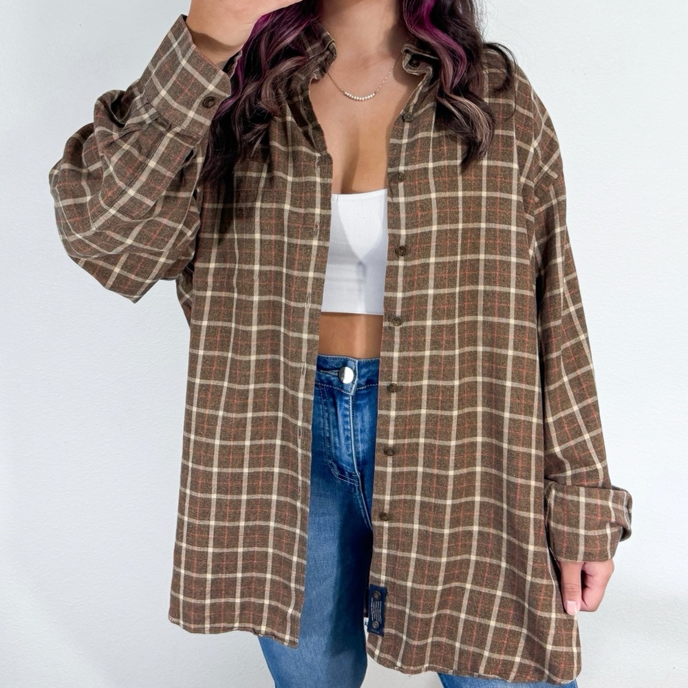 Light brown, cream, and orange flannel